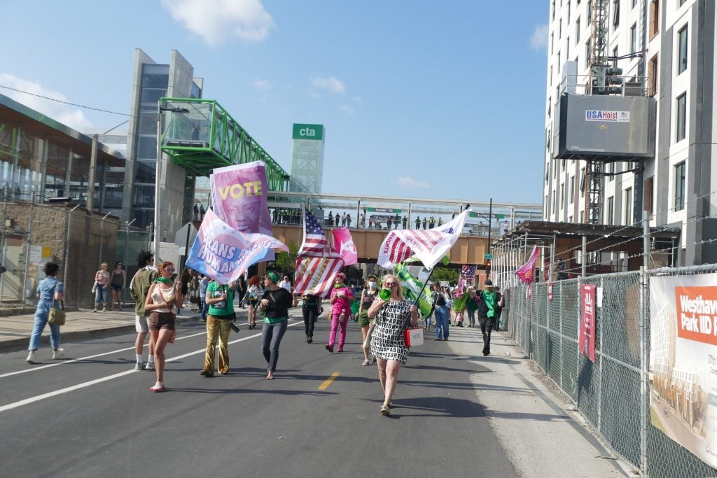 Michele Pred, Whitney Bradshaw and Airco Caravan's "Reproductive freedom" March in which women carried flags and banners in support of access to abortion. 