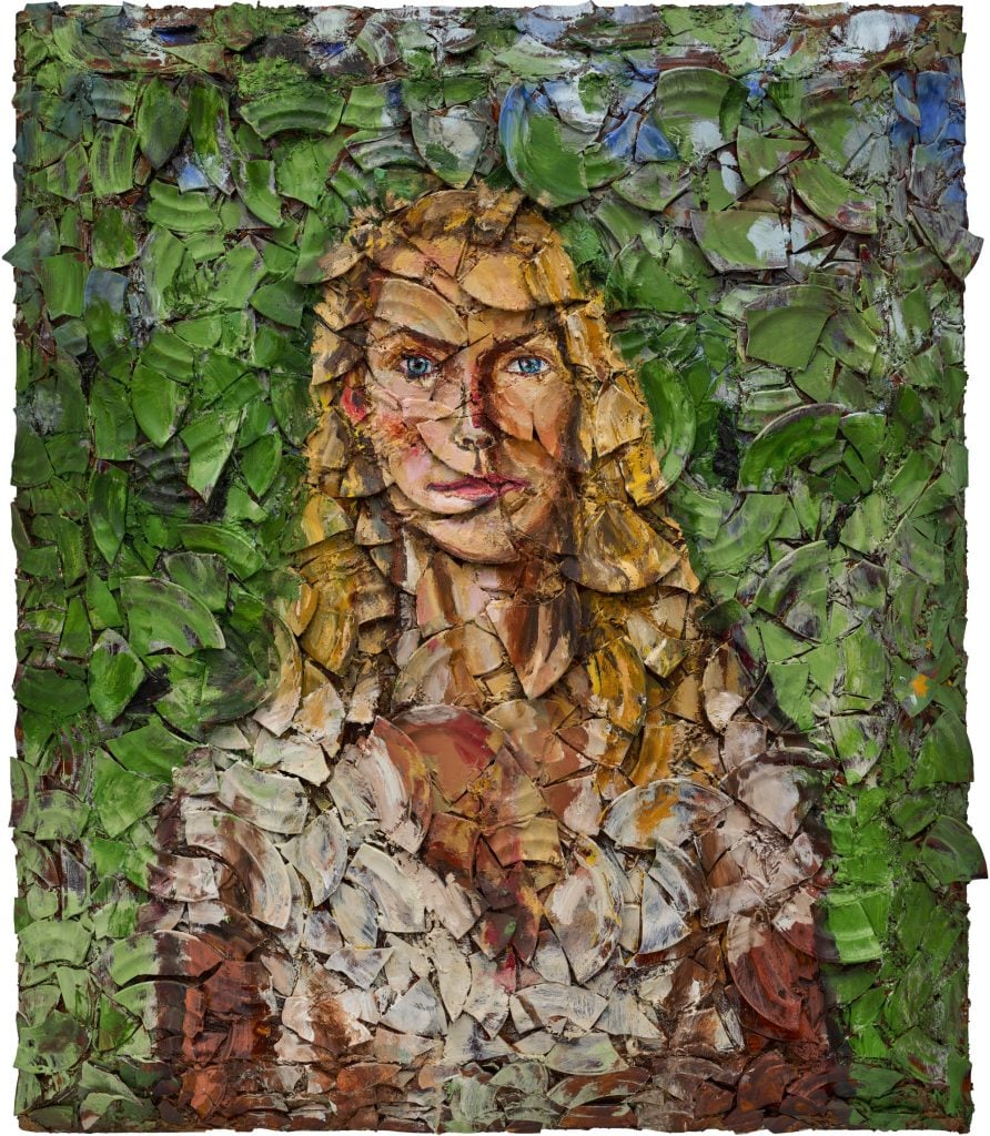 A portrait of a blonde-haired woman painted on broken ceramic shards