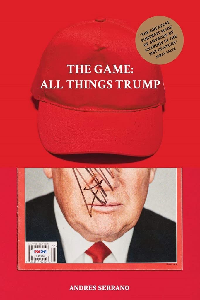 A bright red book cover featuring the lower half of a man's face and a red ball cap that says THE GAME: ALL THINGS TRUMP