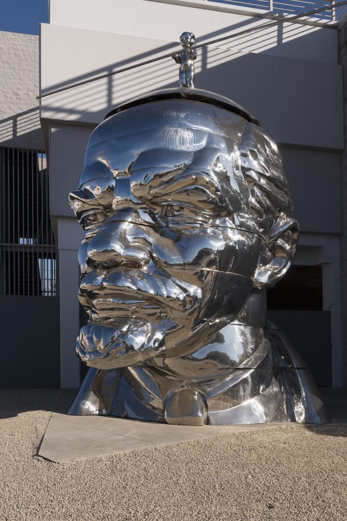 A 21-foot-tall stainless steel sculpture of the head of Lenin with a tiny Mao Zedong on top