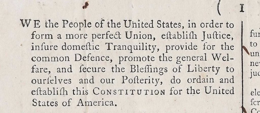 a close up of the opening words of the U.S. Constitution