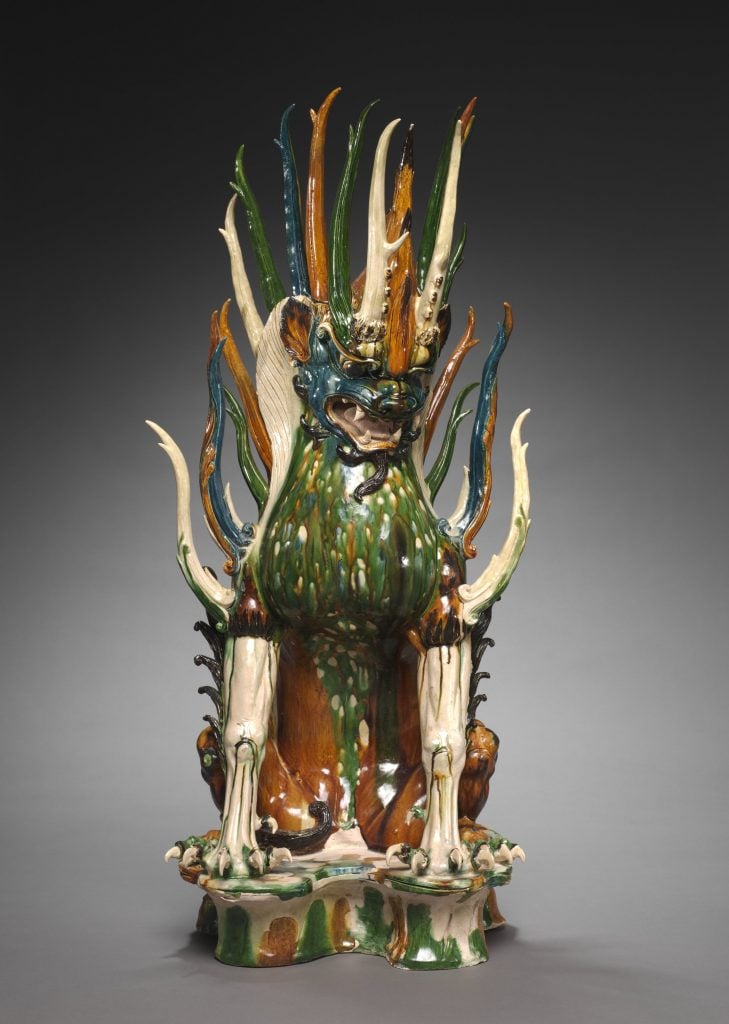 a multicolored pottery guardian animal from Tang dynasty China