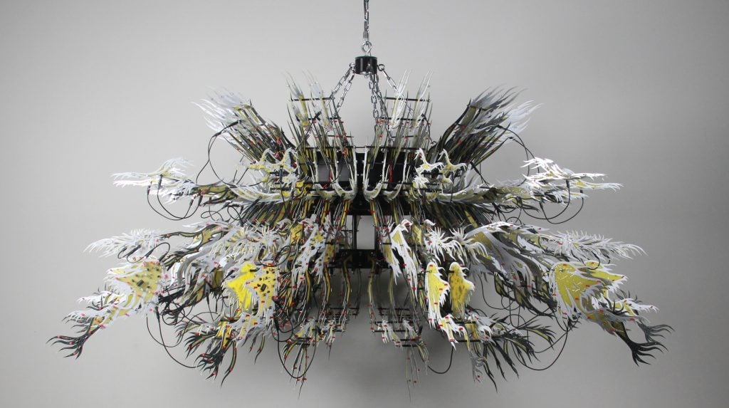 a chandelier is made from circuitboards 