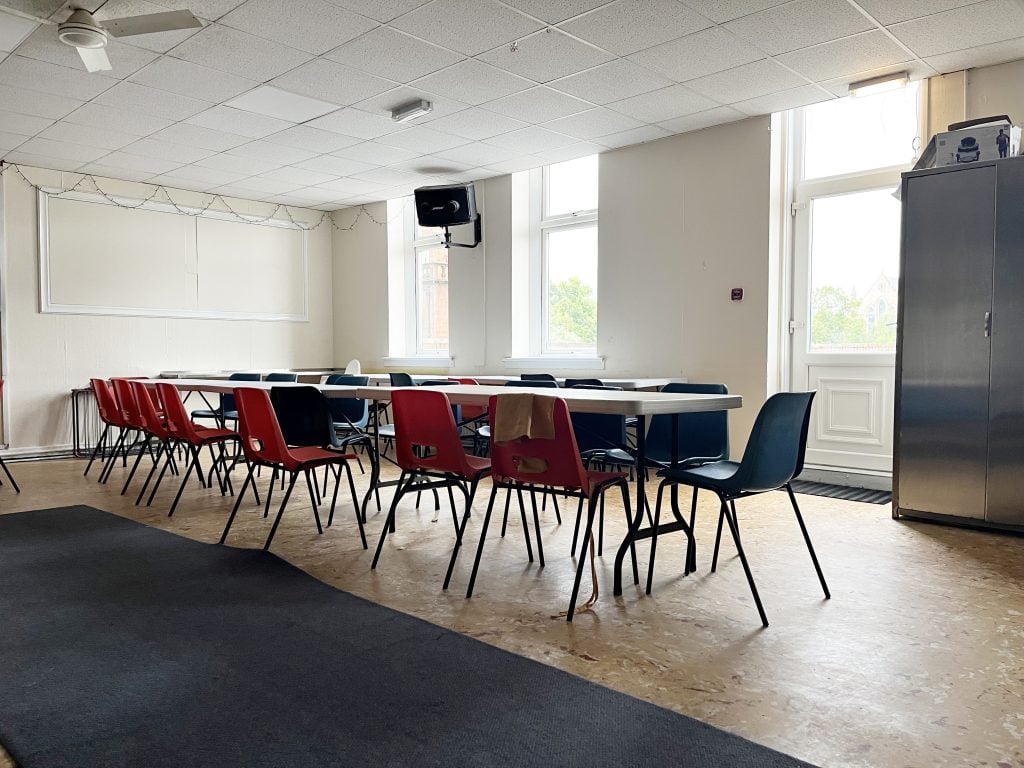 room with a long table and chairs