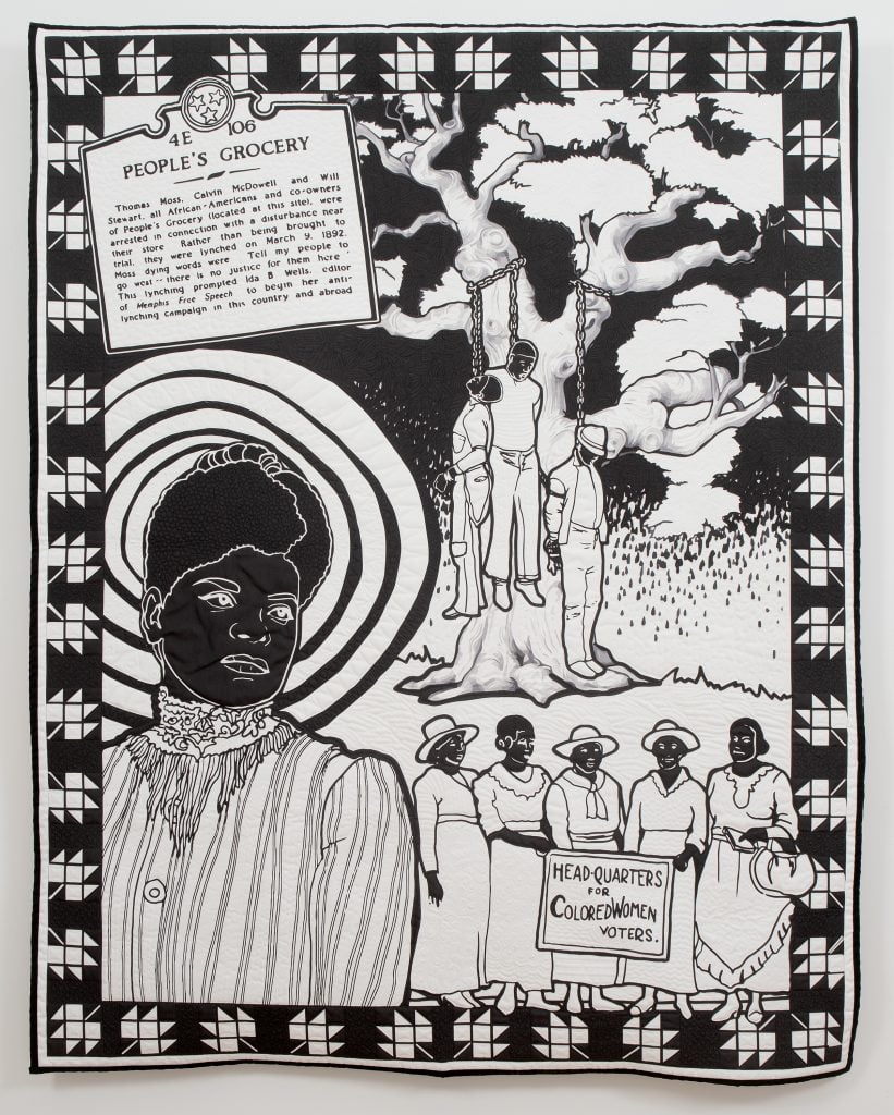 Carolyn Mazloomi, Ida B. Wells: A Crusader for Justice. A black and white art quilt of African American investigative journalist and civil rights activist Ida B. Wells. Behind her in the upper right corner is a small scene of three African American men who have been lynched on a tree. A placard on the top left tells the stories of their deaths, and how it inspired Well's anti-lynching campaign. Next to her is a row of African American women in 19th-century garb standing in front of a sign reading "Headquarters for Colored Women Voters." The quilt has a traditional patchwork design on the border.