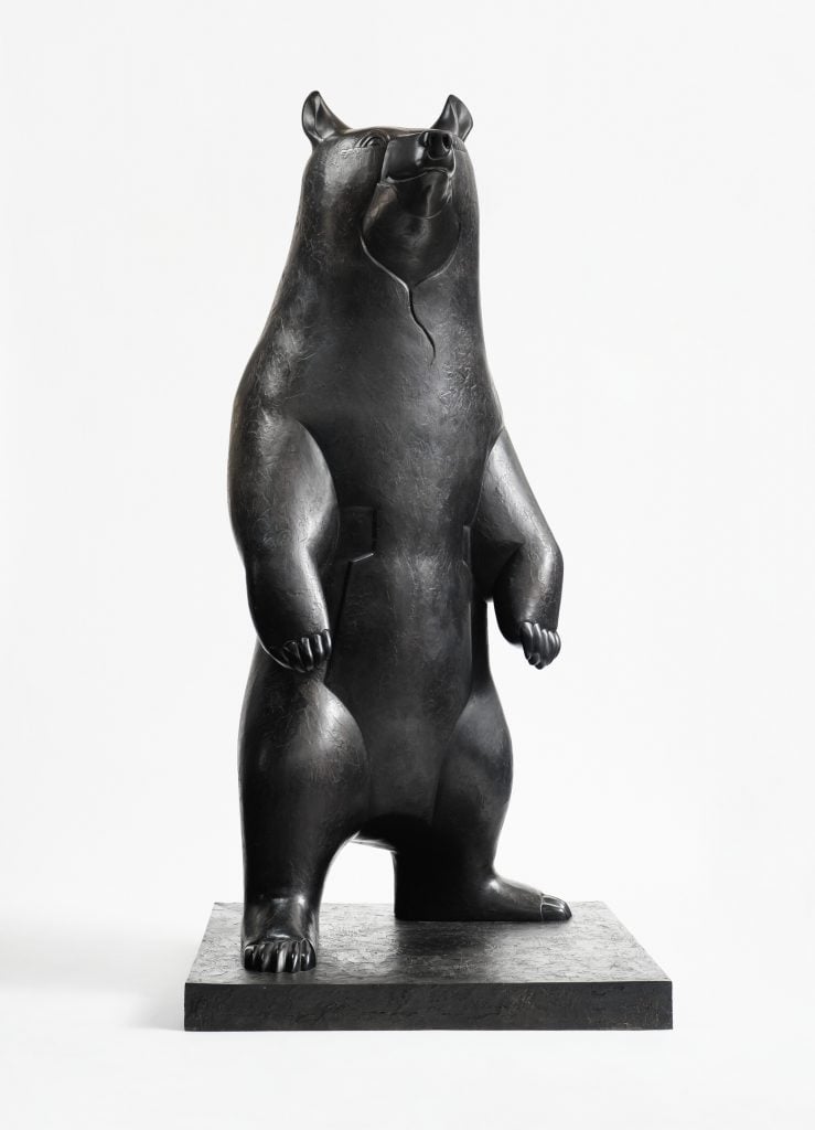 a brass sculpture by Francois-Xavier Lalanne of a giant bear standing on his hind legs