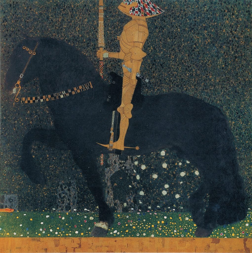 a knight in gold armor on a black horse