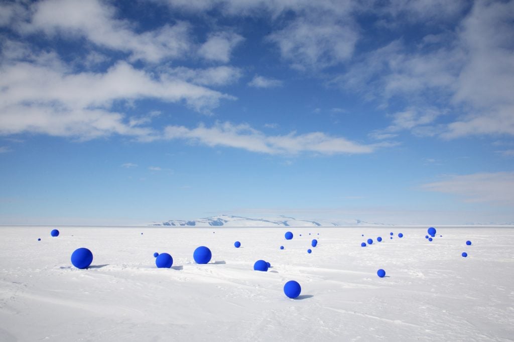 blue spheres on an icy tundra