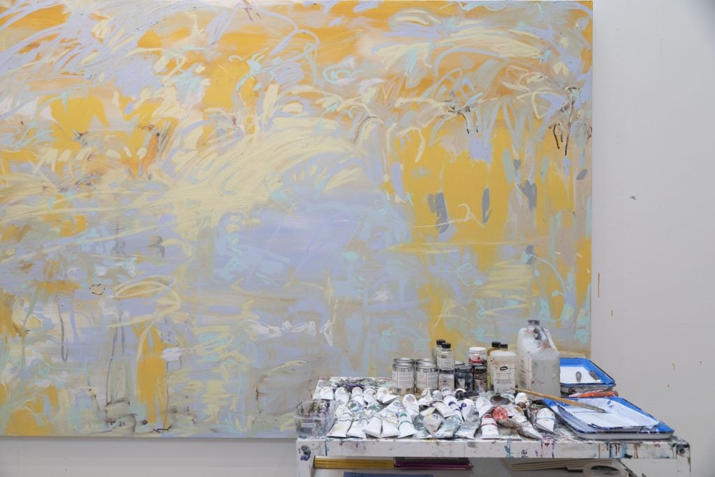 an abstract yellow, lilac, and pale aqua painting in fron