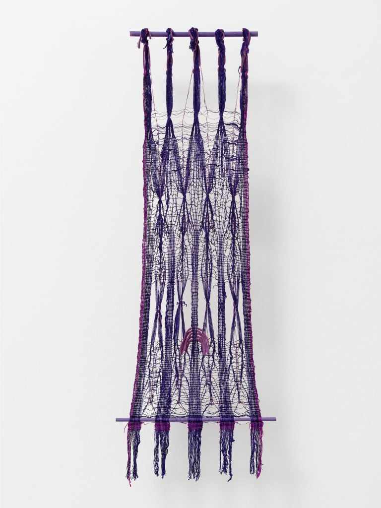 a purple woven art work