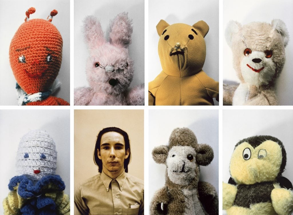 This image is a composite of eight figures arranged in two rows of four. The top row includes what appear to be four different stuffed toys: a red knitted character with small antennae, a worn pink rabbit, a yellow bear with simple facial features, and a beige bear with bright red eyes and a slight smile. The bottom row has another set of four figures: a crocheted character with a rounded head and colorful outfit, a person with long dark hair and a neutral expression, a brown and white stuffed monkey, and a plush yellow and black character resembling a bee. The collection presents a mix of handmade toys and a human figure, evoking a nostalgic, possibly eerie, atmosphere.