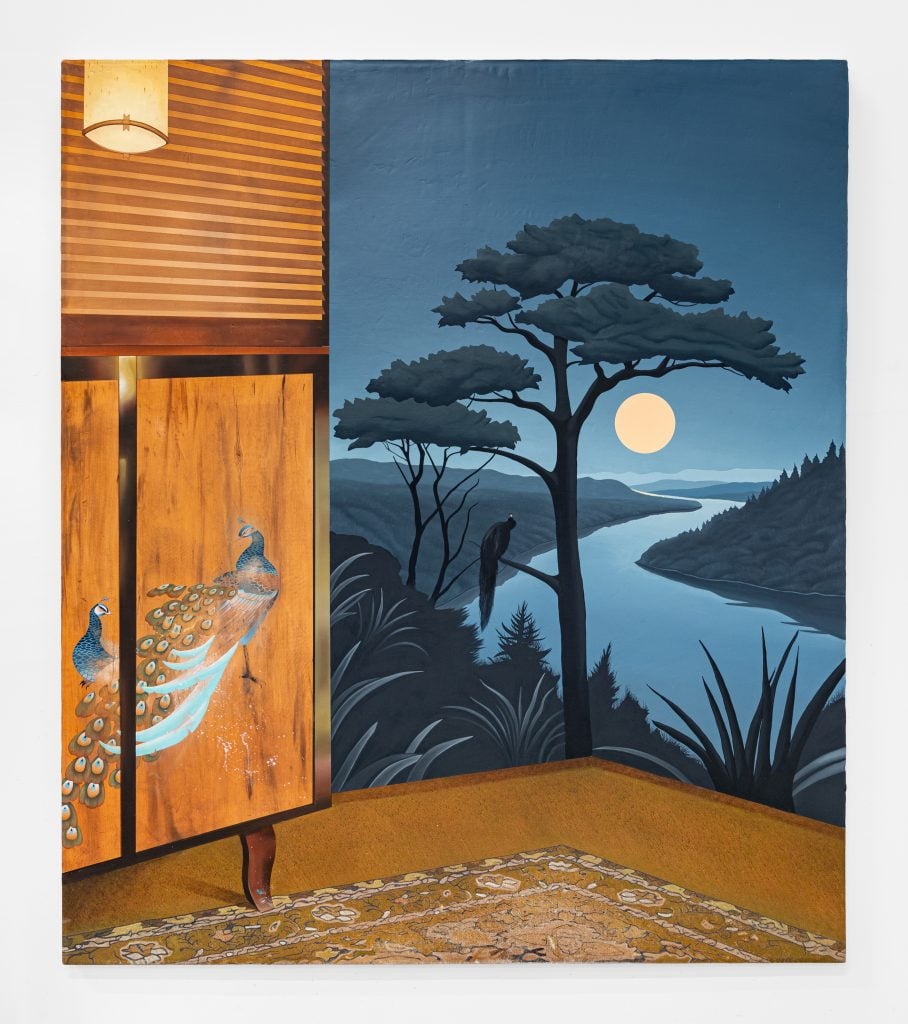 Stephen Thorpe, "Inward Journey into the Luminous Darkness of the Unconscious" (2024). A photorealistic painting of the corner of a room, with European armoire with peacocks painted on it and an Orientalist rug, with a surrealist nighttime landscape of the full moon rising above a river with a tree.