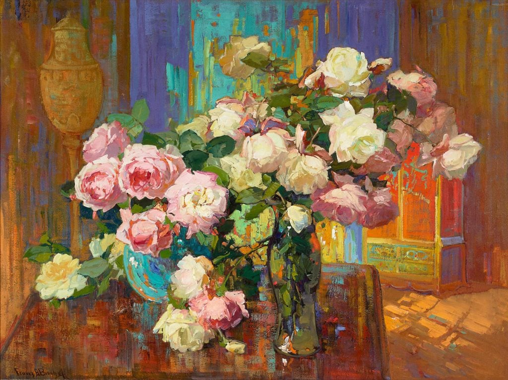 an image of roses in a vase