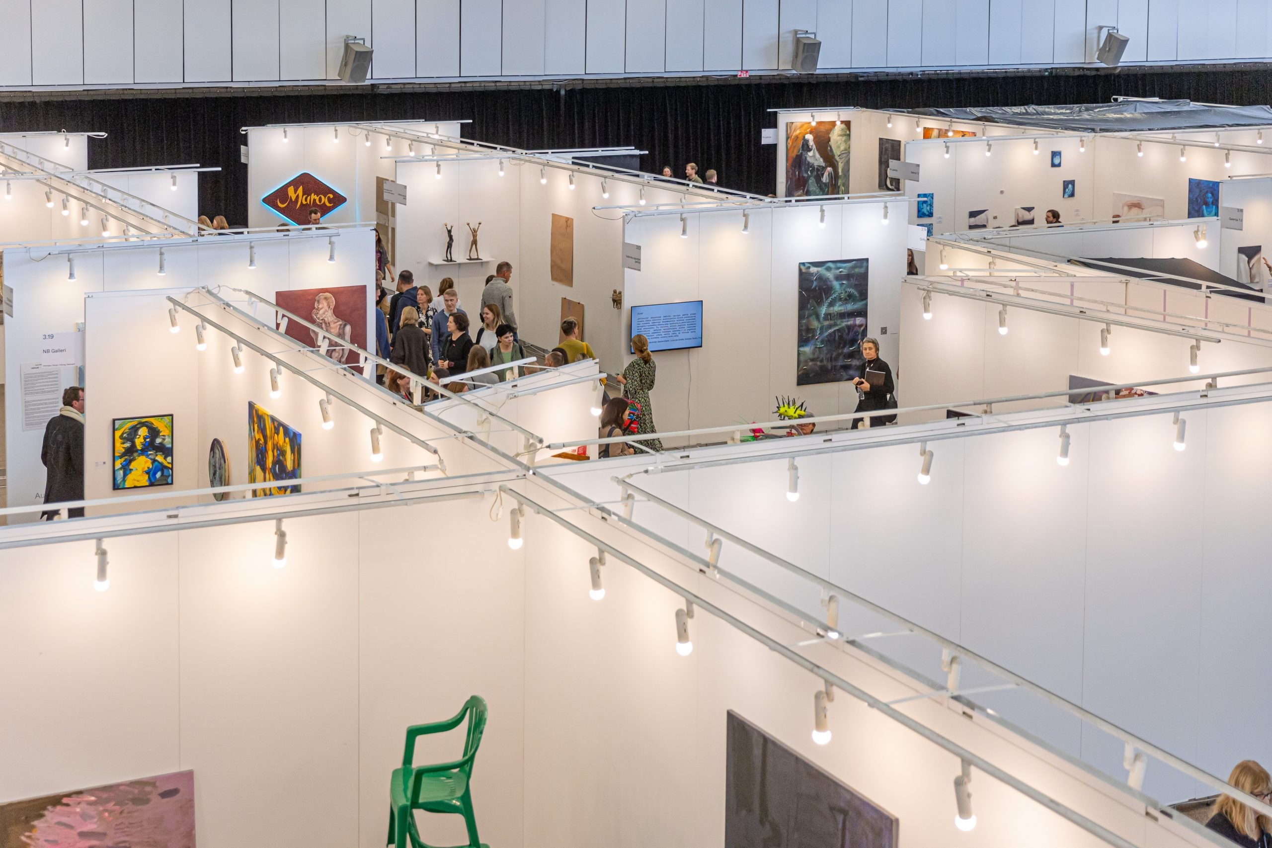 A view over the top of dozens of booths at the 2023 ArtVilnius art fair.