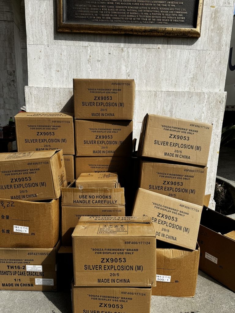 Many boxes labeled "Silver Explosion" stacked against a wall