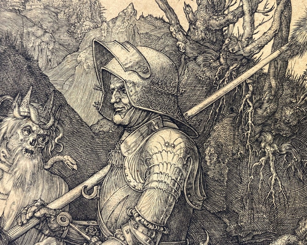 a close up of the knight on horseback from the engraving