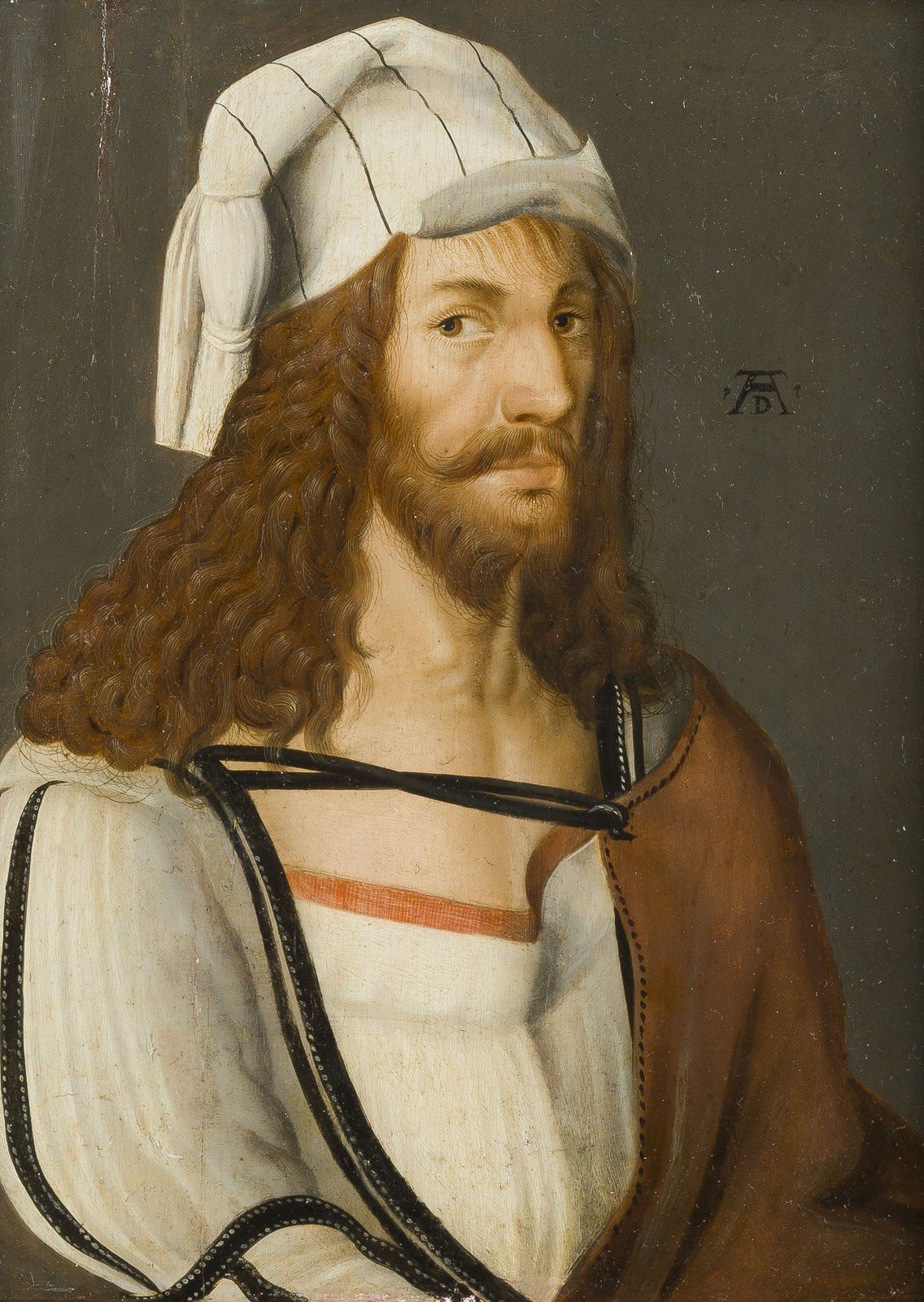 A painting of a bearded man in Renassance-era clothing