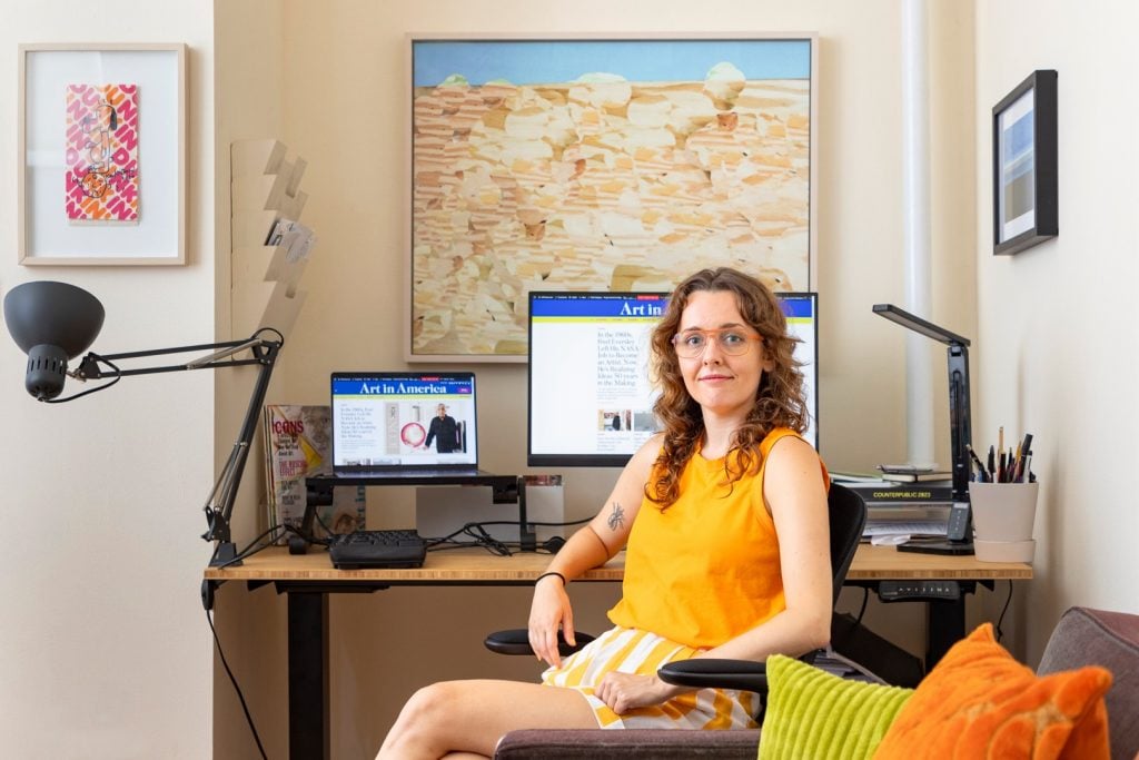 Critic Emily Watlington at her desk.