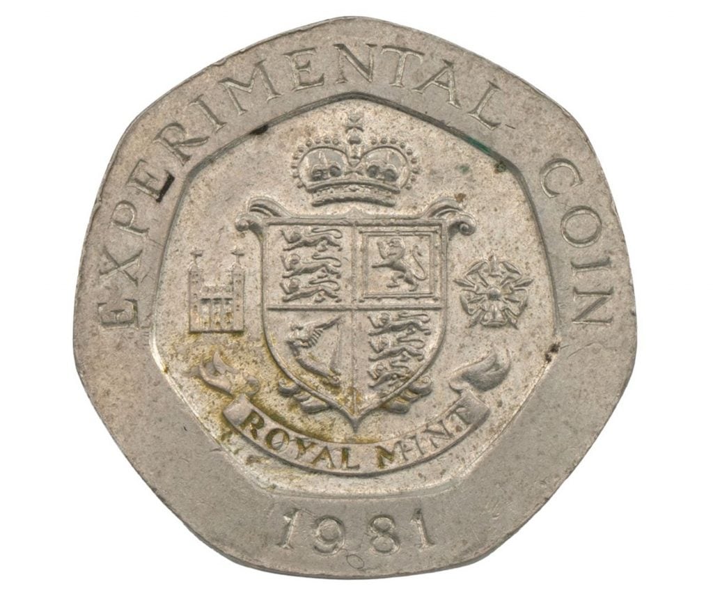 A seven-sided 20 pence coin that reads 