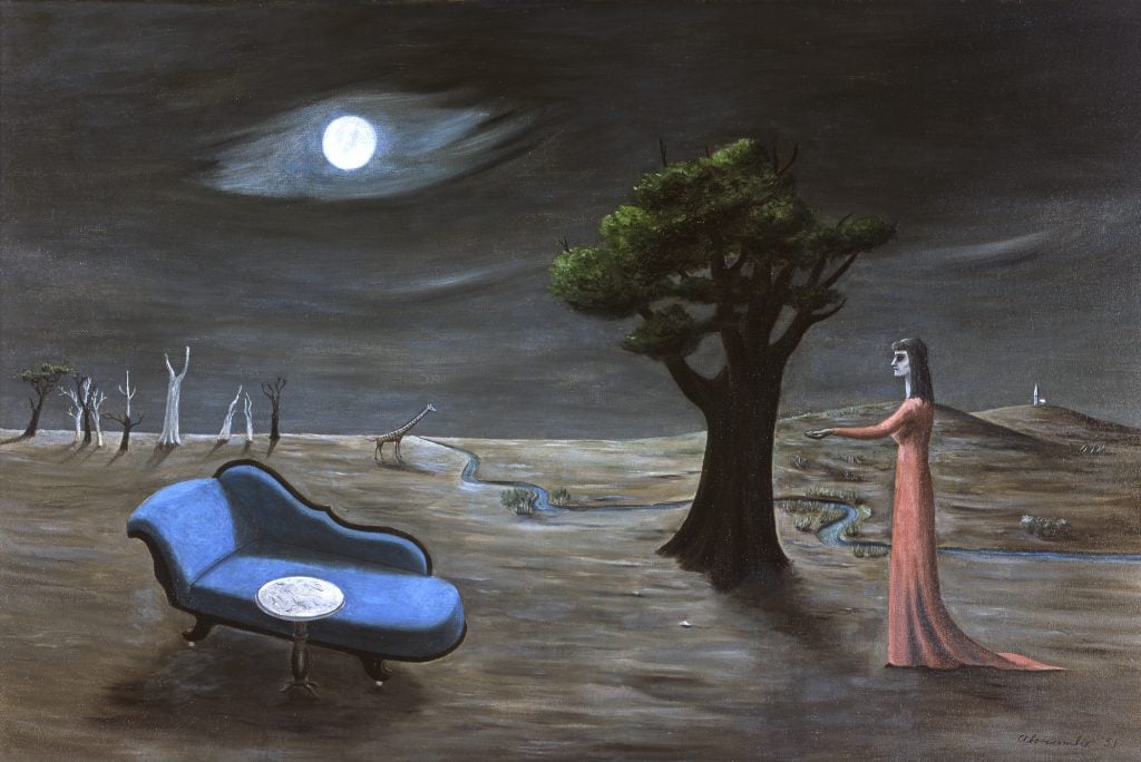 A painting of a nighttime natural landscape with a white full moon in the sky, a large tree on the right in front of which is a woman in a long red dress, and on the left a blue chaise lounge. In the distance a giraffe approaches a river, and there is a copse of trees.