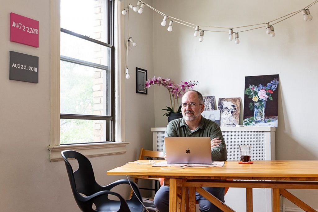 Critic Greg Allen at his desk.