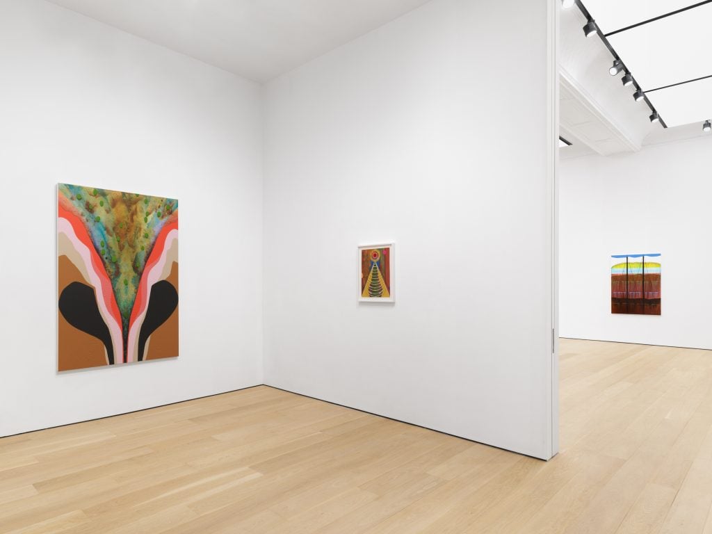 Installation view of Carrie Moyer solo show titled "Timber!" showing a smaller gallery room with one large-scale abstract painting opposite a small abstract work on paper.