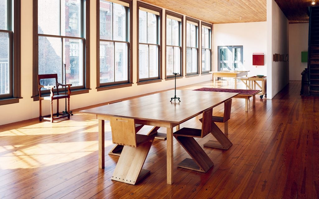 A photograph of a table in the light drenched SoHo home of Donald Judd