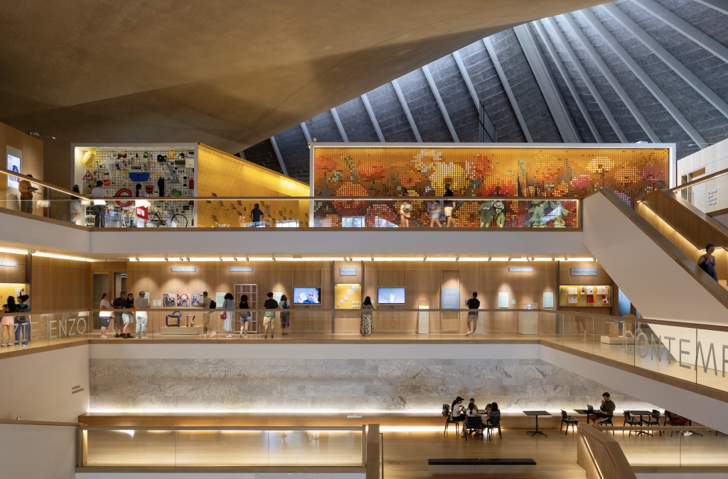 A photograph of the two story, open, airy, and modern interior of the Design Museum London.