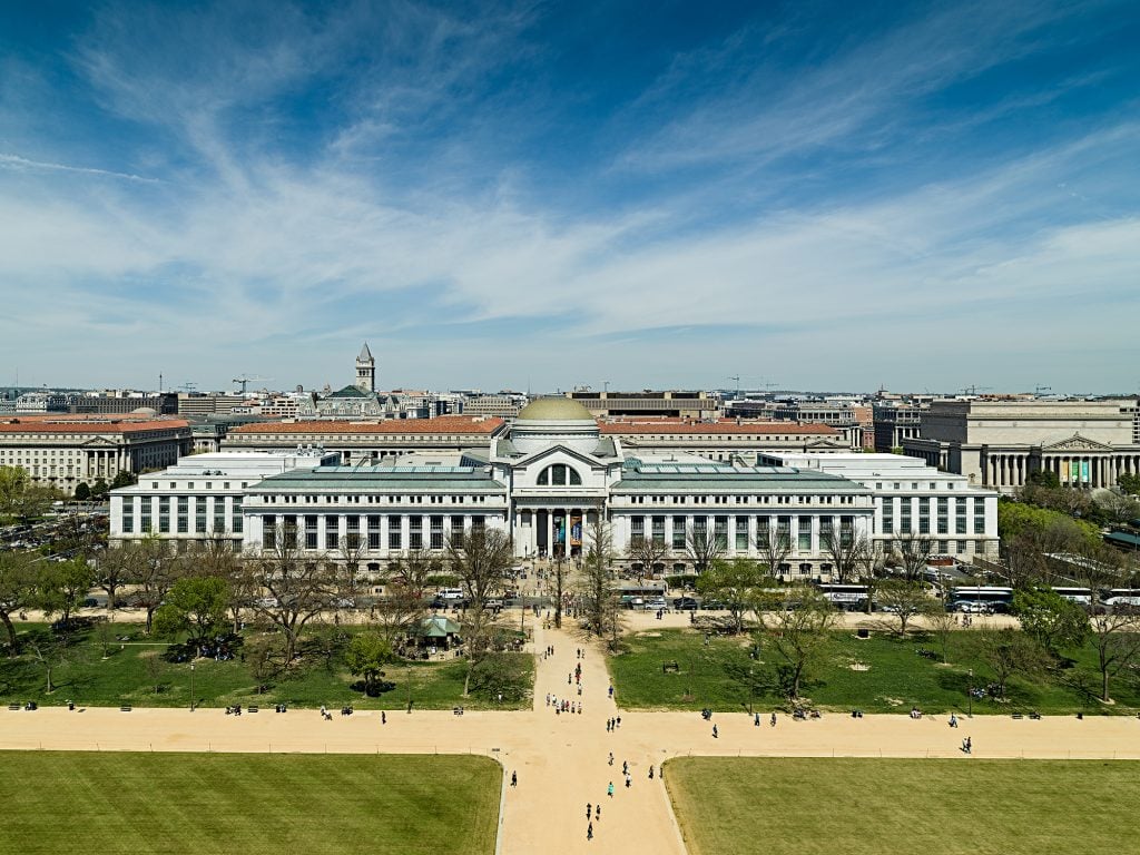 Panoramic photograph of a Greek-style building housing the National Museum of Natural History in Washington, D.C.