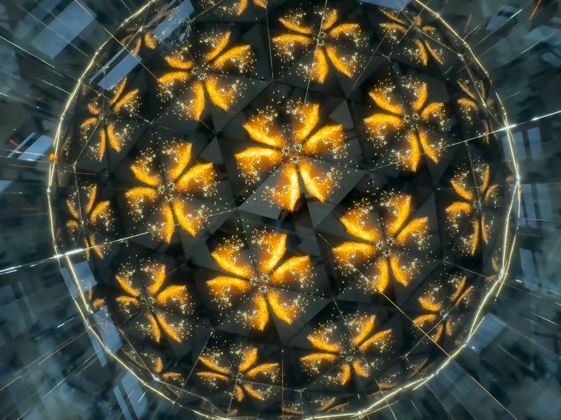 A kaleidoscopic sphere made up of smaller geometric triangles