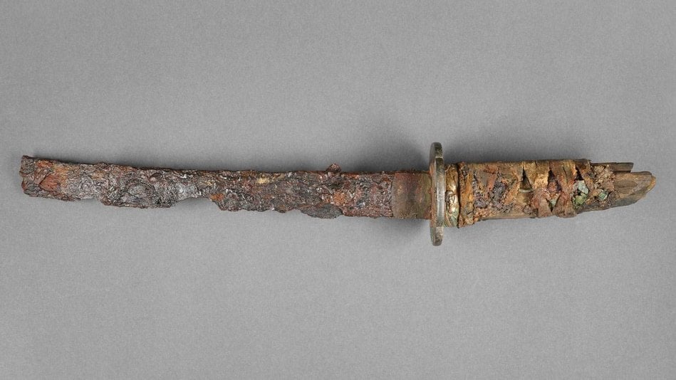 overhead view of corroded sword following its restoration