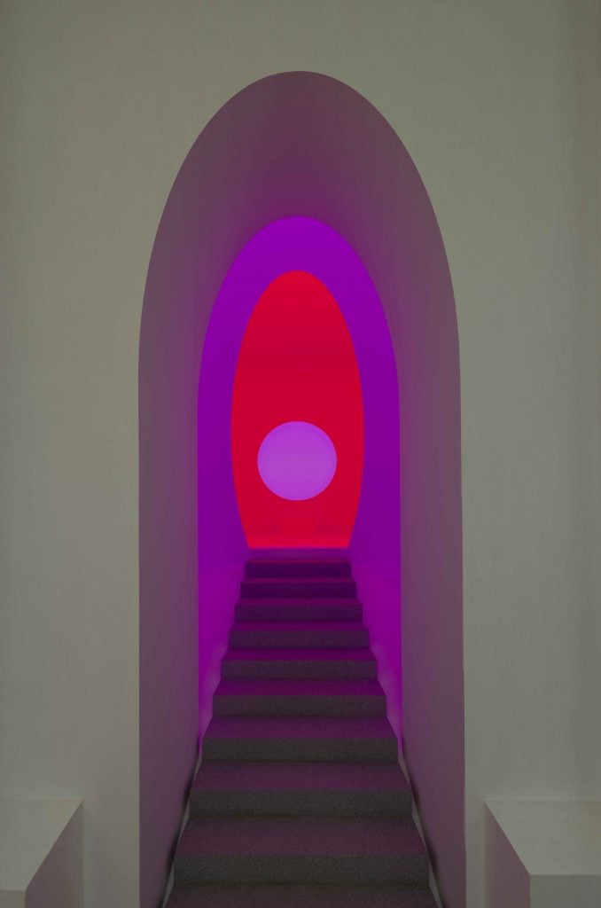 A stairway leading to a geometric, purple space centered by a lilac dot