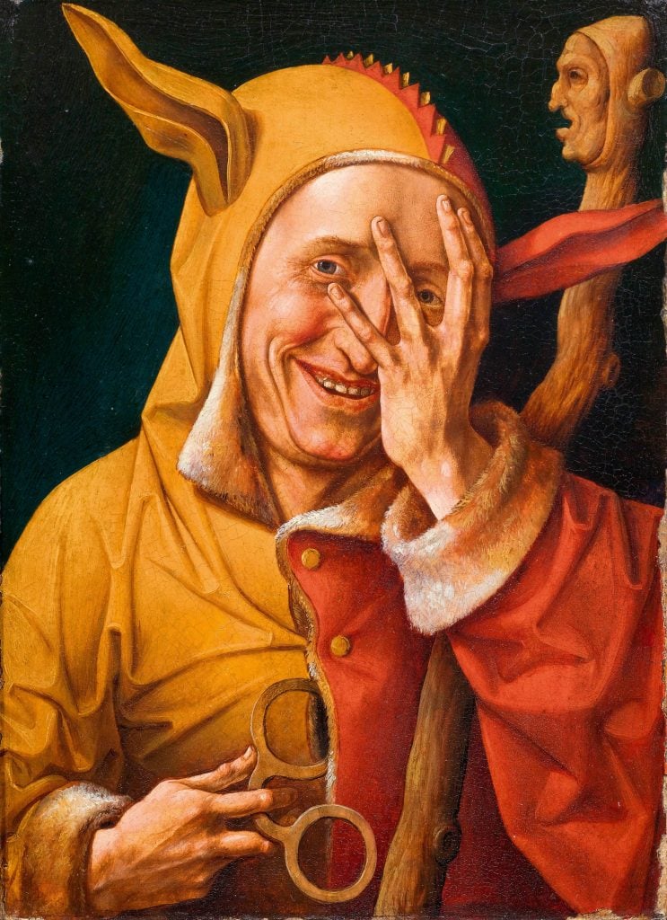 Maître de 1537, Portrait of a fool looking through his fingers. Former Netherlands, c. 1548. Oil on canvas, H. 48,4 cm ; l. 39,6 cm. Anvers, The Phoebus Foundation © The Phoebus Foundation