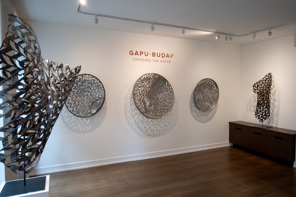 an image of wall-hung steel sculptures at D'Lan Contemporary in New York