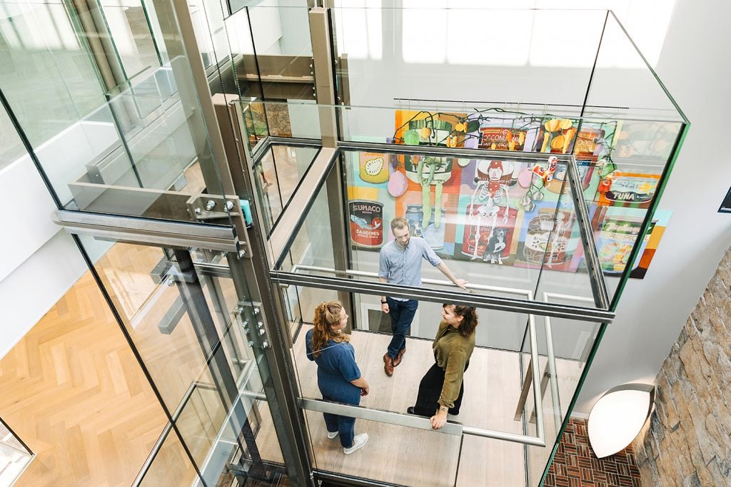 The glass elevator at the LAM museum where a technician accidentally threw out Alexandre Lavet's beer can artwork.