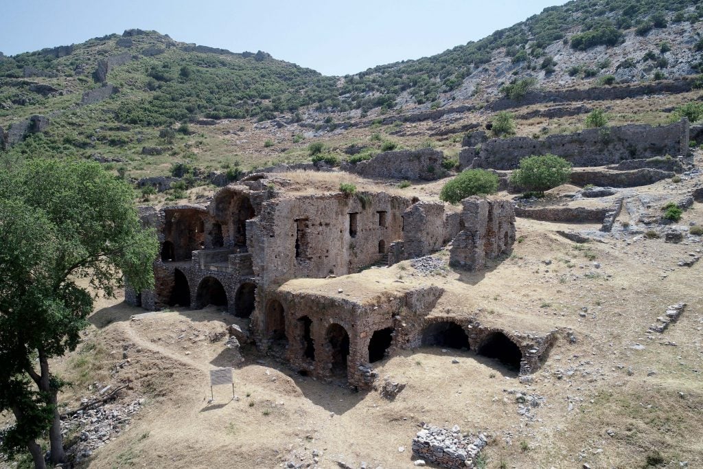 Aerial shot of the ancient city of Anemurium's ruins in Turkiye.