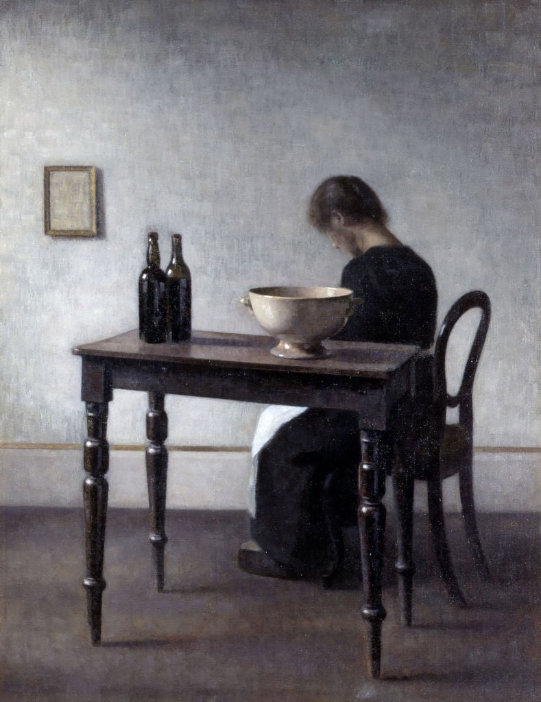 woman sitting at a table