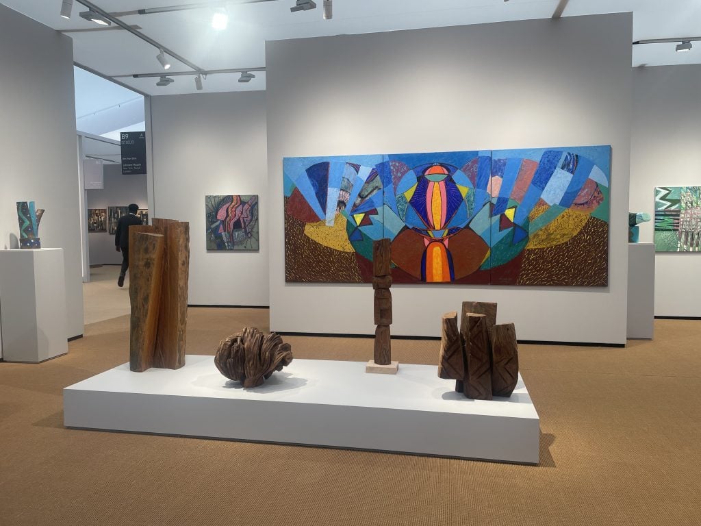 Display of wooden sculptures and paintings