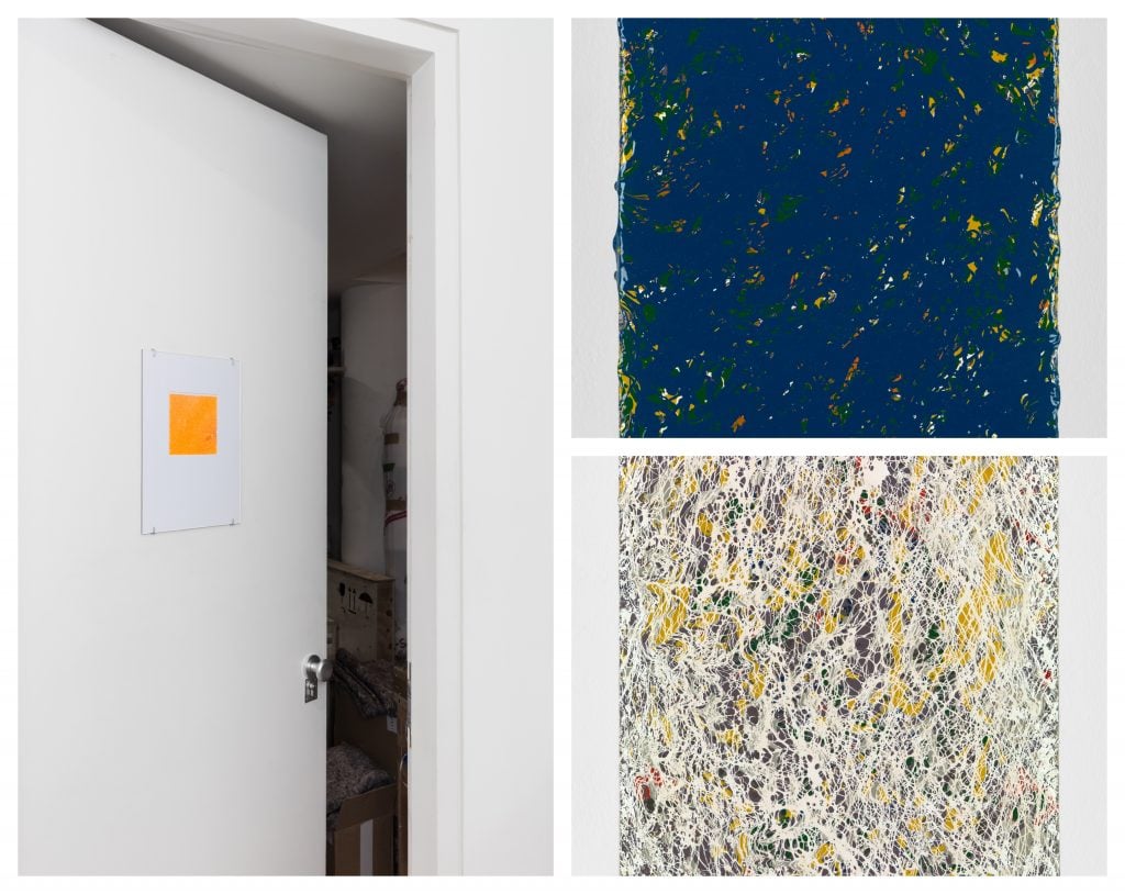 Abstract artwork collage with two splatter-painted canvases and an orange square on a door.