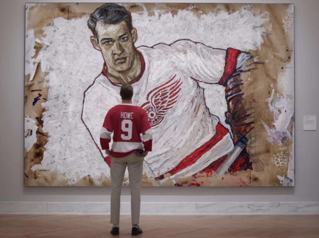 A still from "Darren McCarty's Day Off" from filming at the Detroit Institute of Arts. The scene from Ferris Bueller's Day Off is remade with a painting of Gordie Howe, whose jersey features prominently in the film.