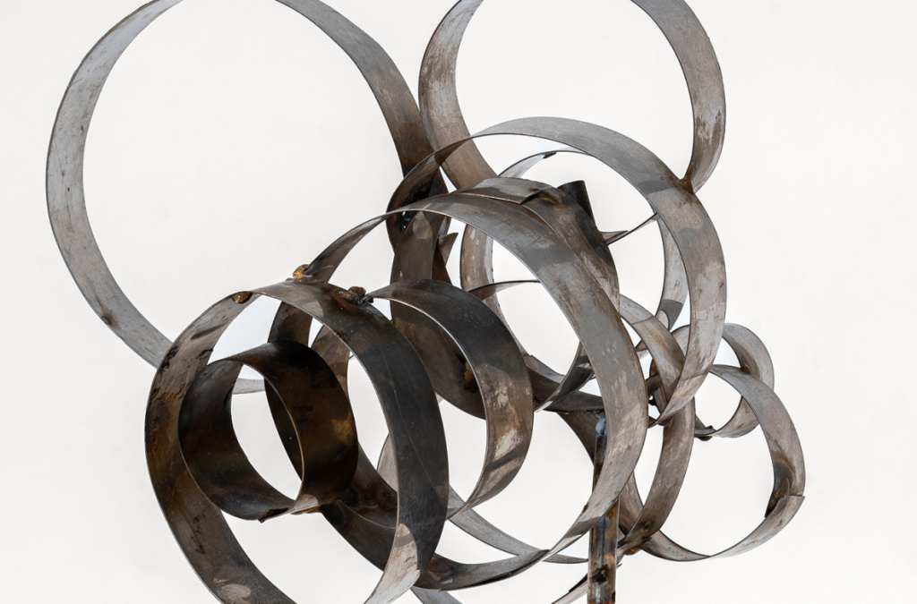 A metal sculpture of various rings by Feliza Bursztyn shown by the Mayor Gallery at Frieze Masters.