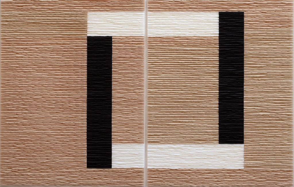 A geometric abstract diptych with a tan ground and a square with alternating sides in black and white.