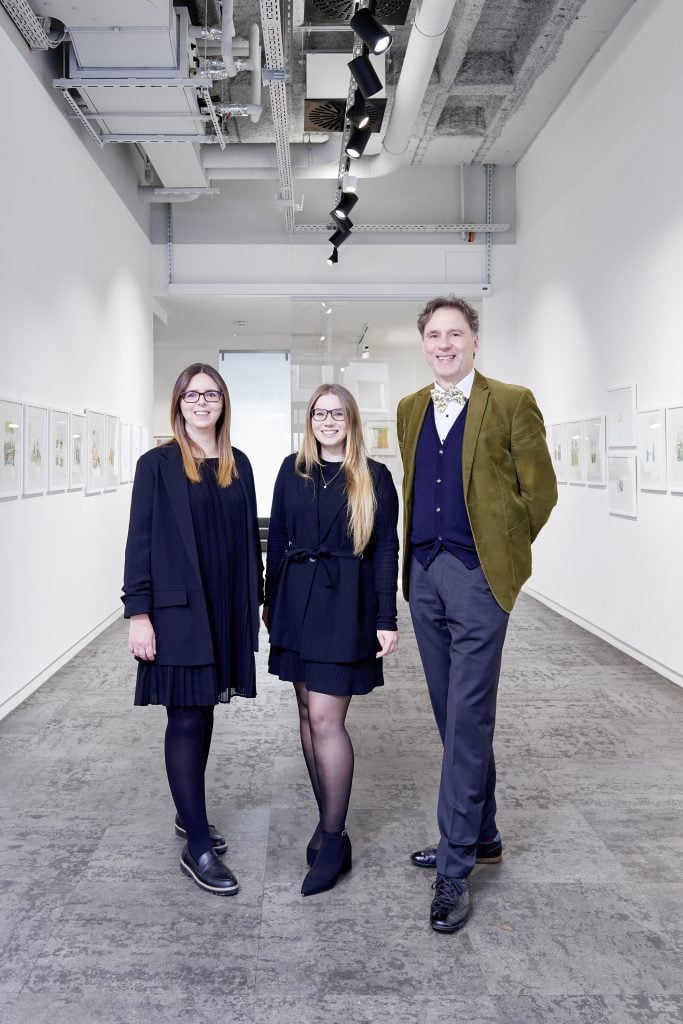 Kalus D. Bode and his two daughters laura bode and anna bode inside the gallery space of Galerie Bode.