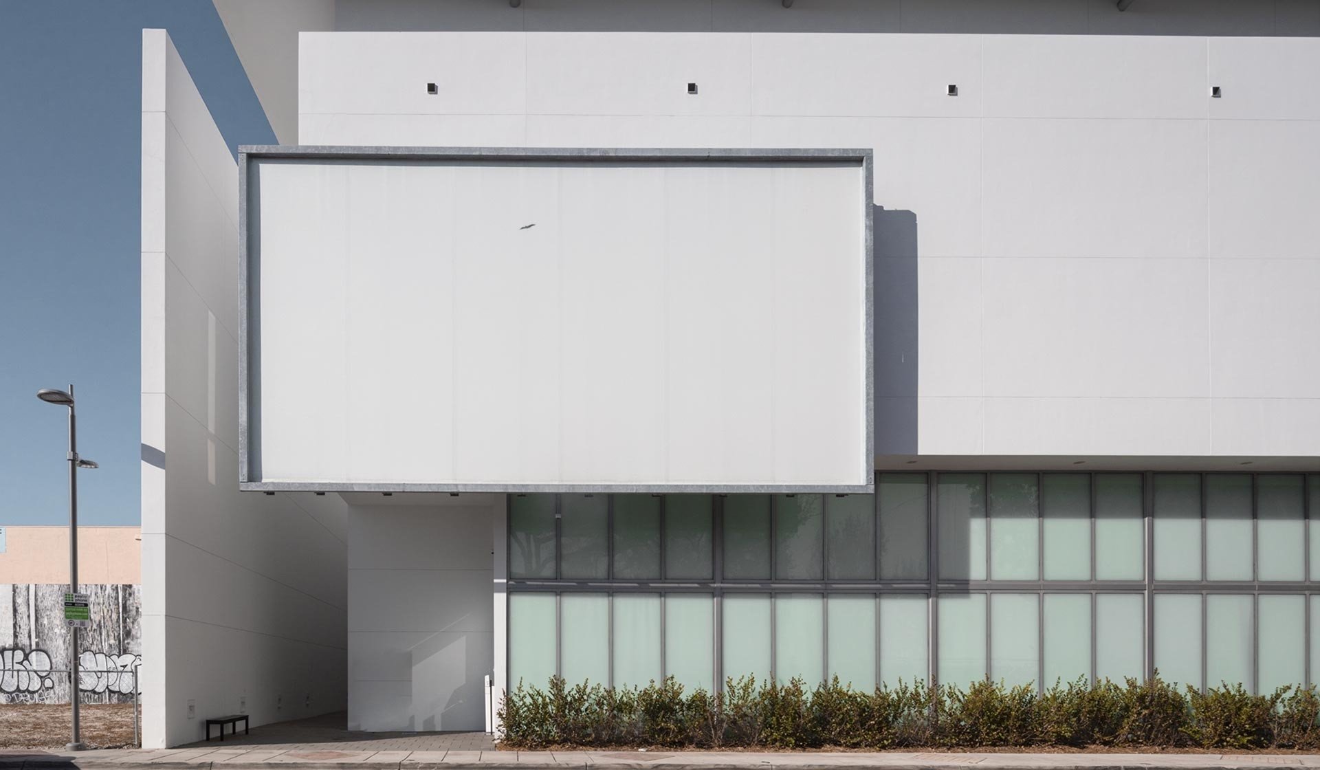 the exterior of a white building in Miami