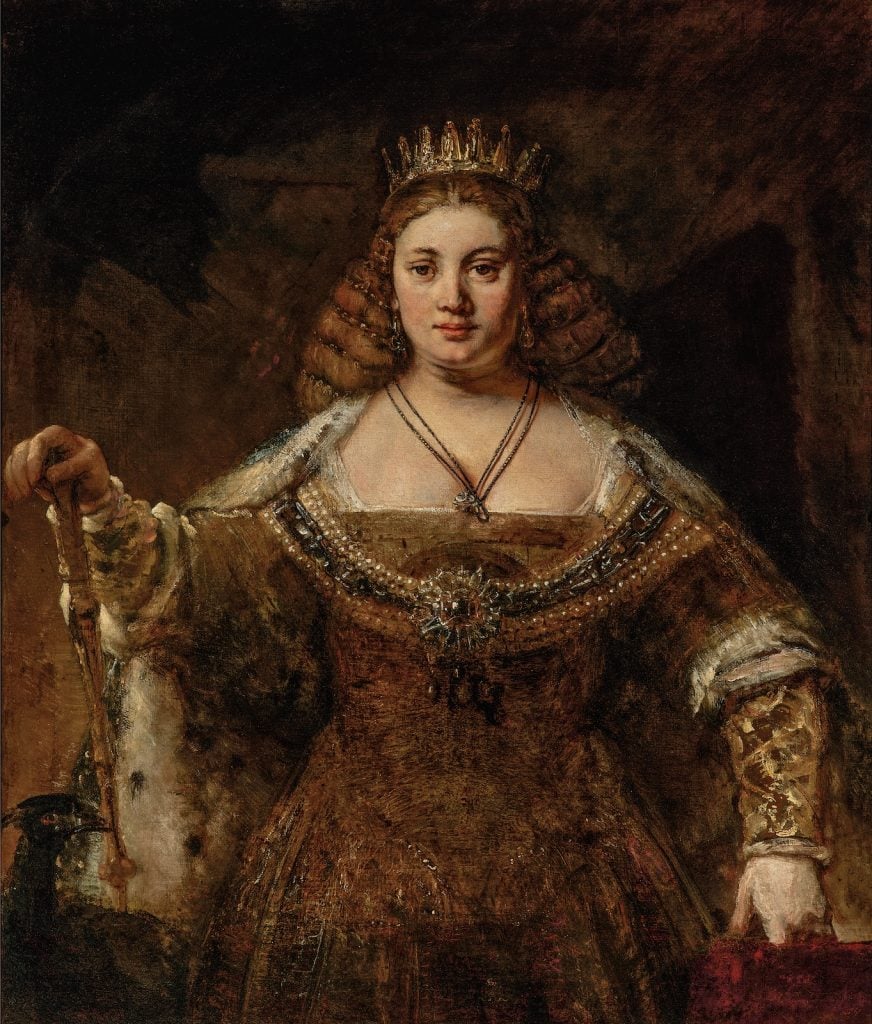 A Rembrandt painting of a woman in elaborate clothing and a crown