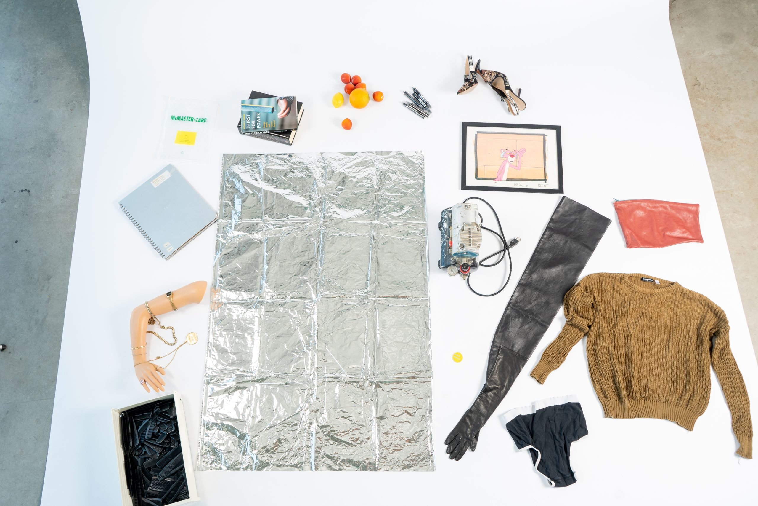 An array of random objects lying on the floor. 