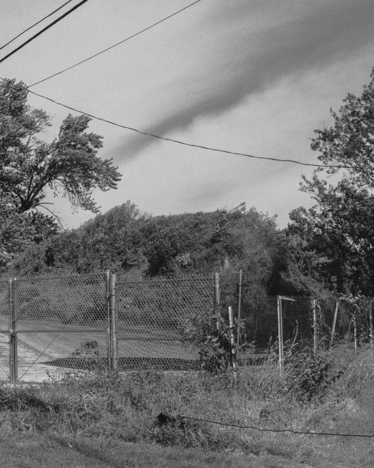 An undated black and white photograph of Sugarloaf Mound without any homes on it, taken at least 80 years ago.