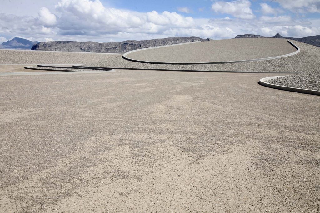 a grey landscape is a massive sculpture 