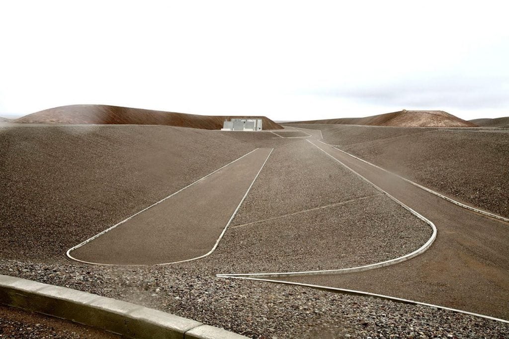 geoglyph like lines are carved into a landscape in an artwork 