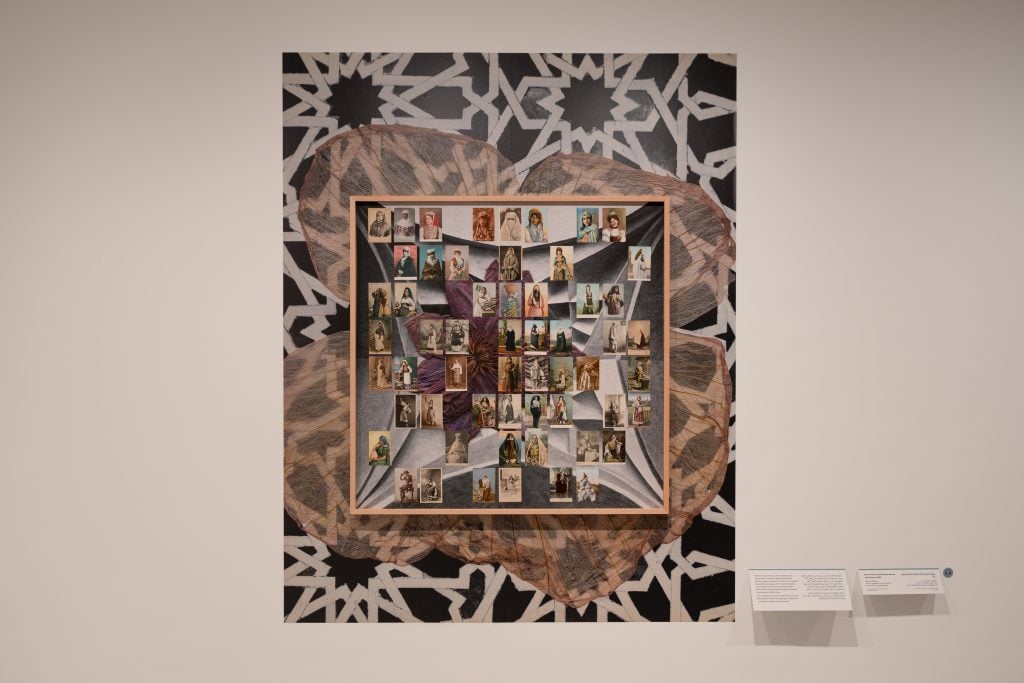 Photo collage by Aikaterini Gegisian with numerous postcards depicting various Ottoman women in the central frame, behind which is an oversized pressed flower on a rectangular cutout of a print with an Arabic geometric pattern.